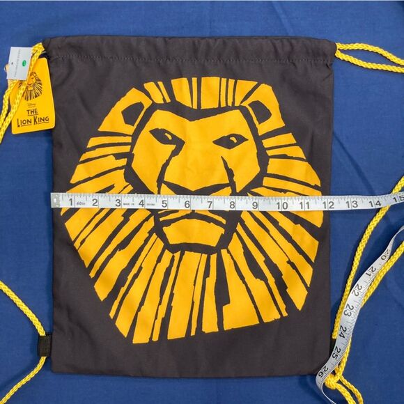 Disney The Lion King The Broadway Show Drawstring Bag Logo Yellow Black NWT - Picture 2 of 8